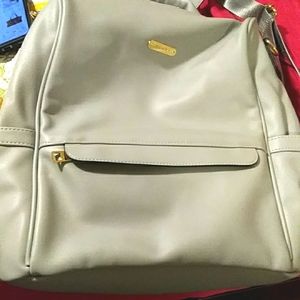 Cluci women's purse backpack never used